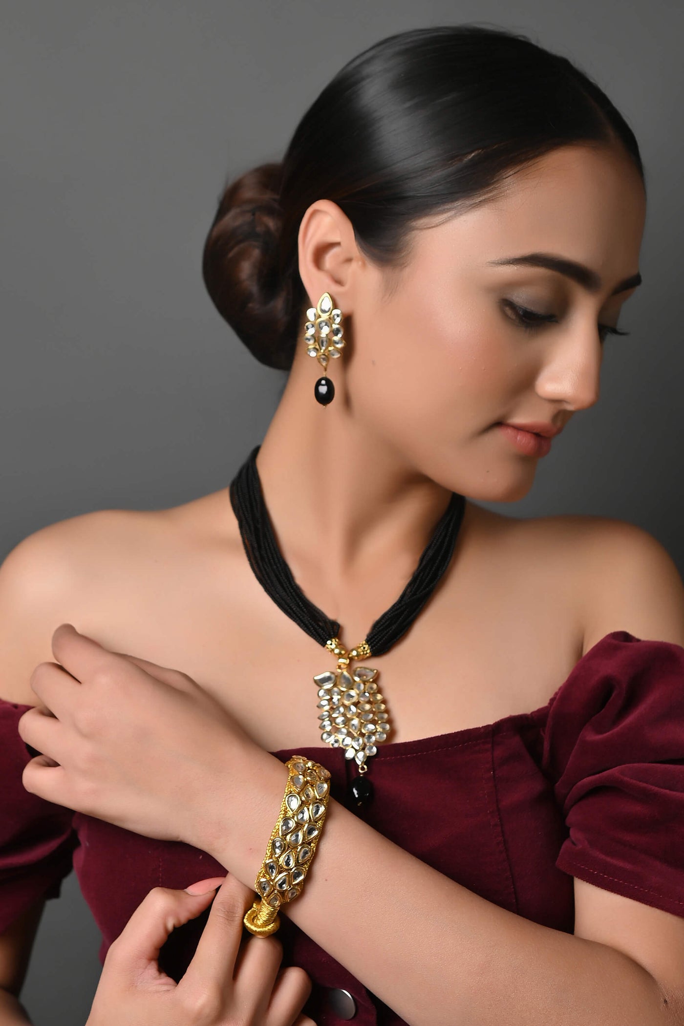 Kundan Pendant Set With Earrings And Bracelet
