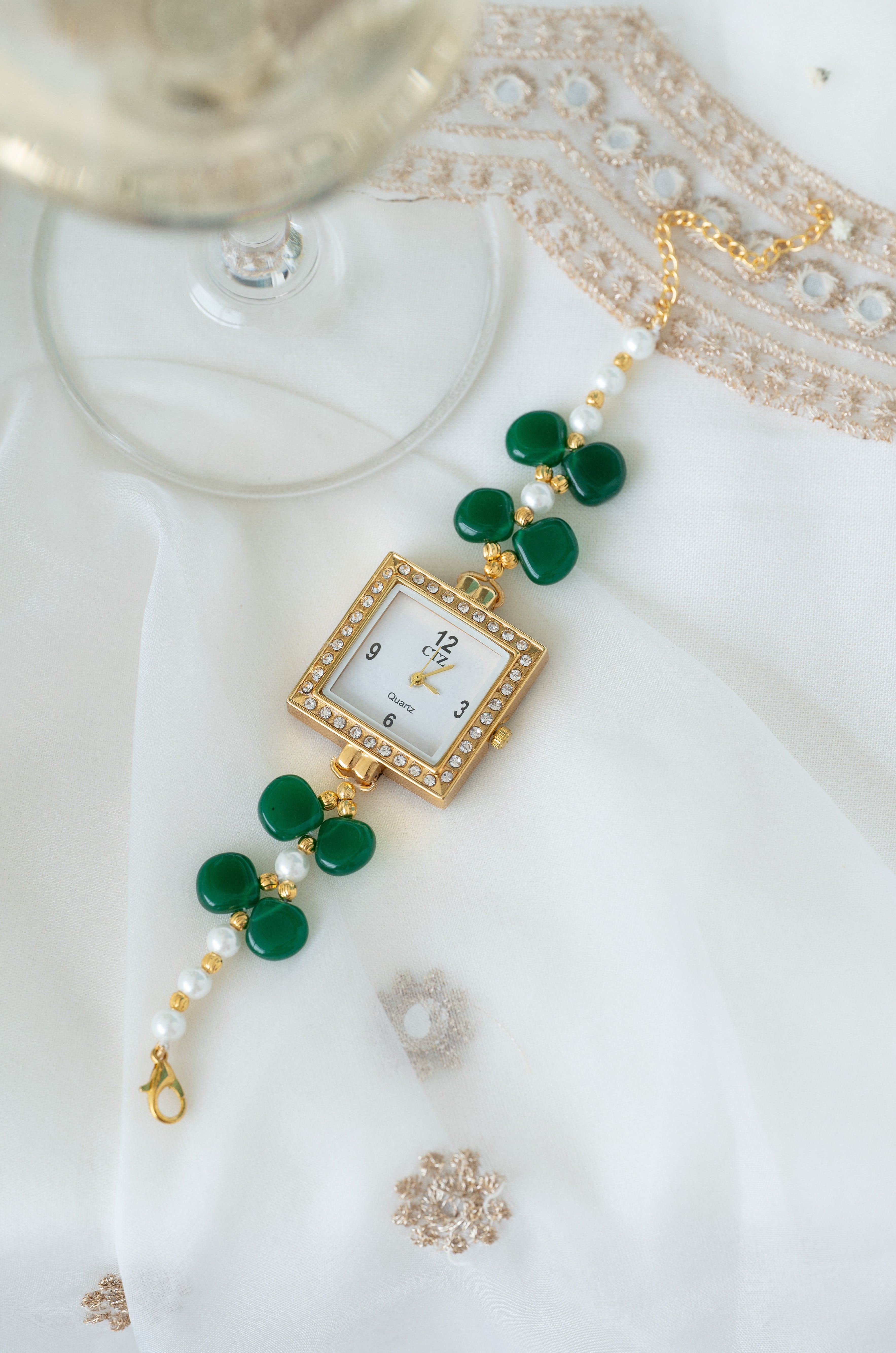 Elegant Green Beaded Gold Plated Dial with Pearl Accents