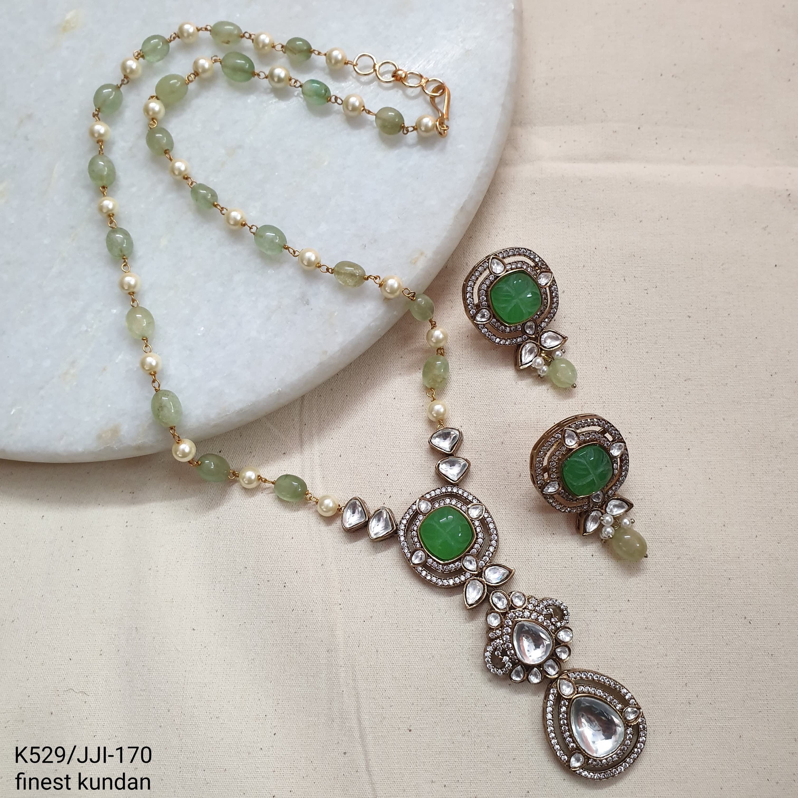 Green Stone Kundan Delicate Pendant Set With Earrings