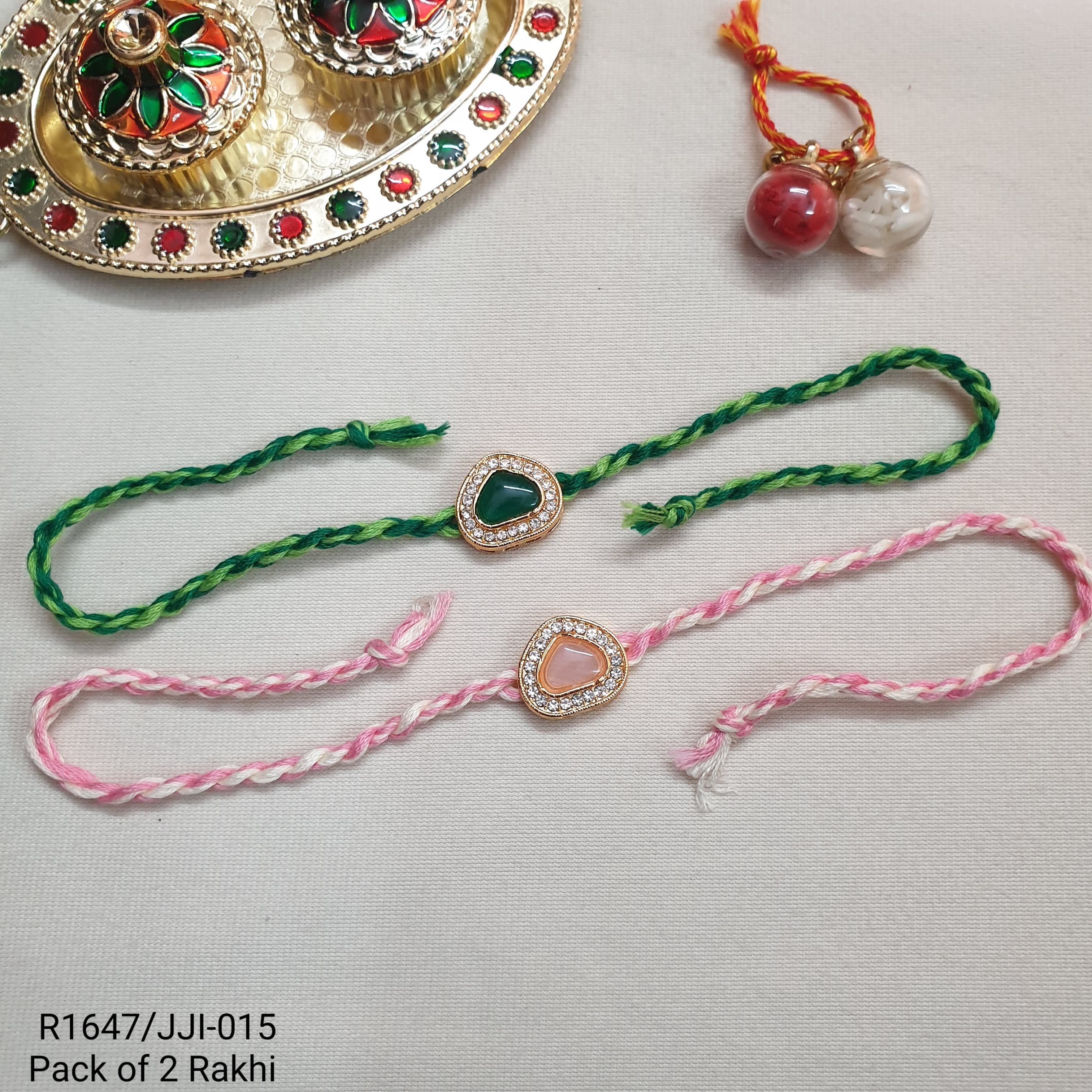 Drop Kundan Stone Rakhi For Brother And Sister (Pack Of Two)