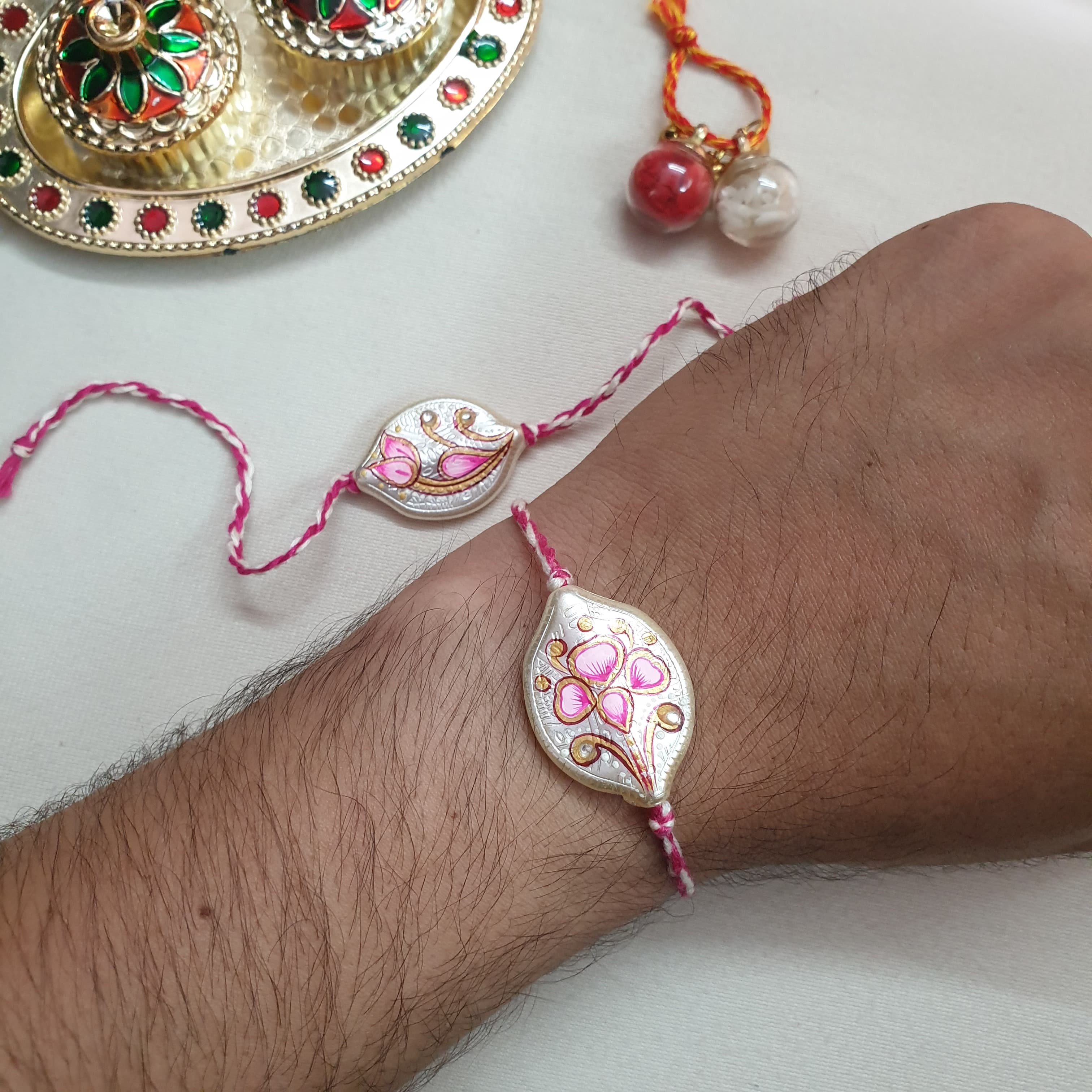 Meenakari Pearl Rakhi (Pack Of Two)
