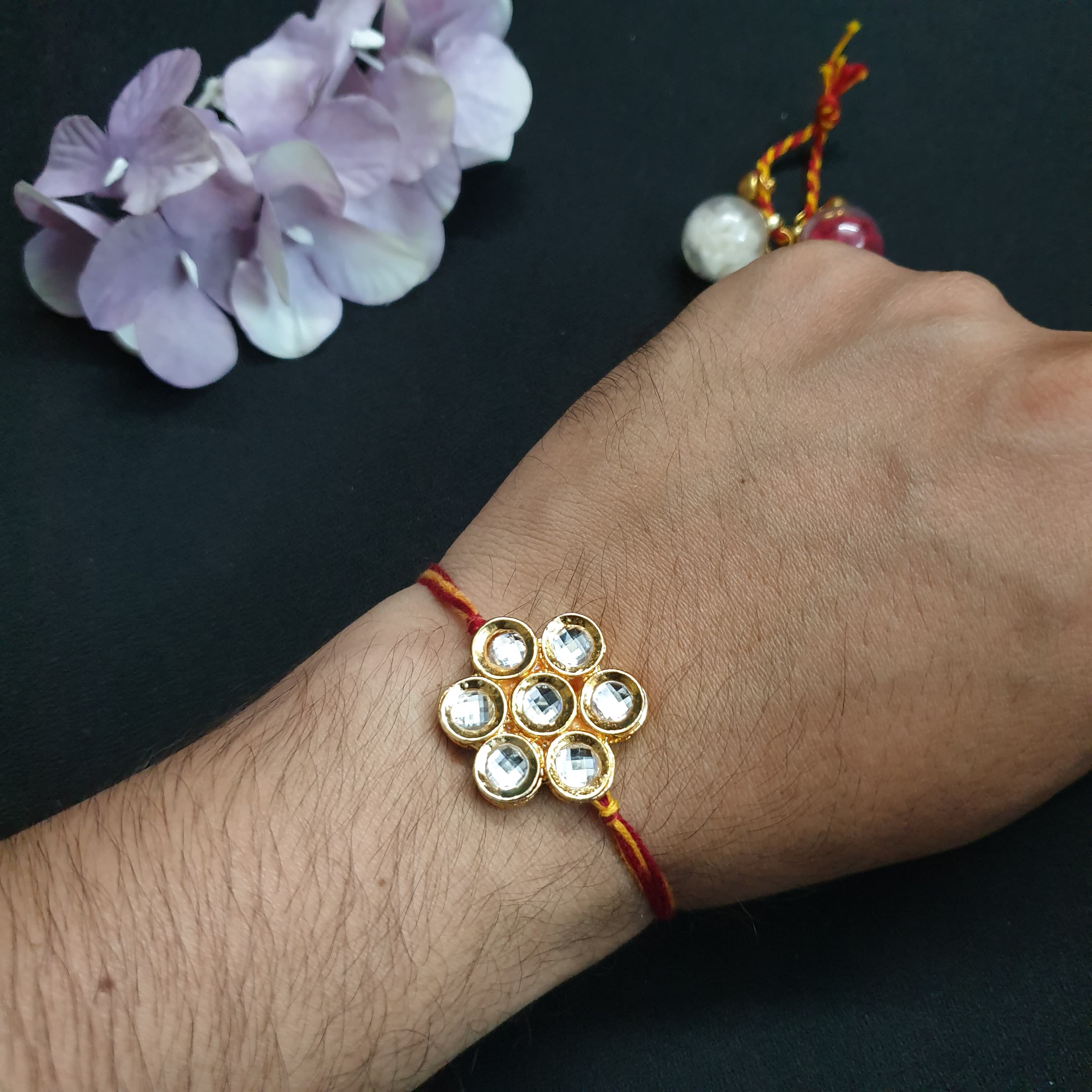 Round Kundan Floral Rakhi (Pack of One)