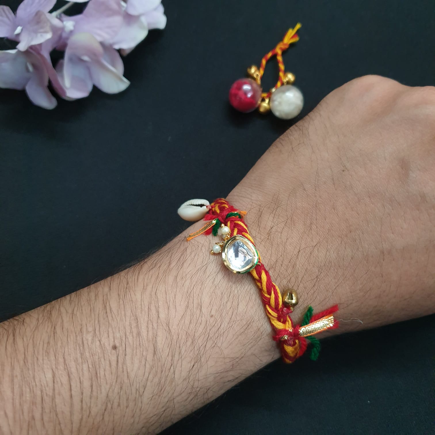 Designer Kundan Mauli Red Rakhi (Pack of One)