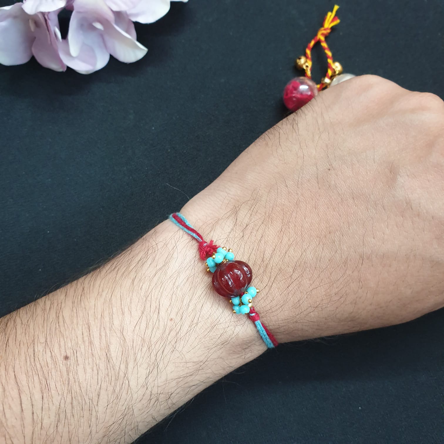 Maroon Pumpkin Bead Rakhi (Pack of One)
