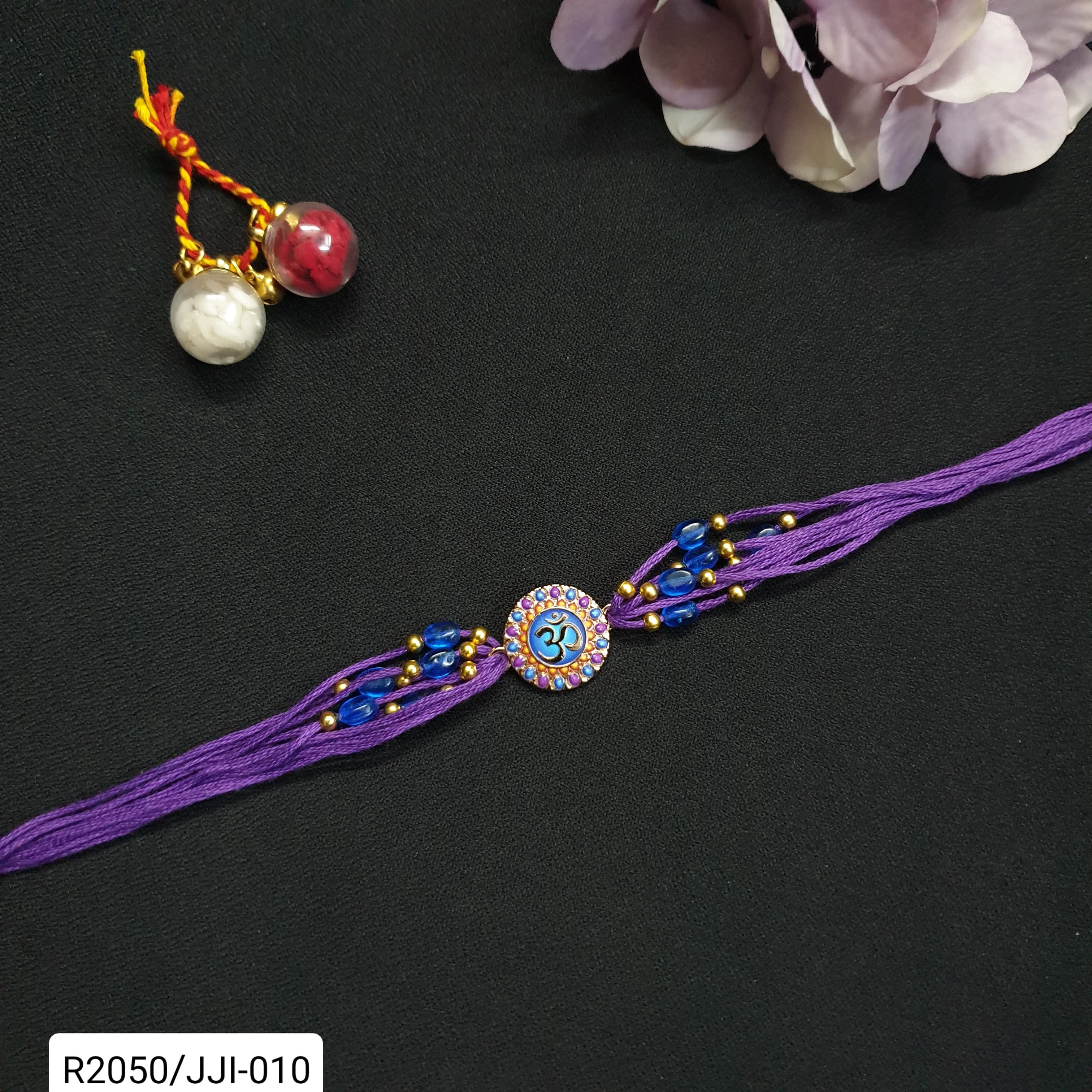 Purple Om Beaded Rakhi For Rakshabandhan