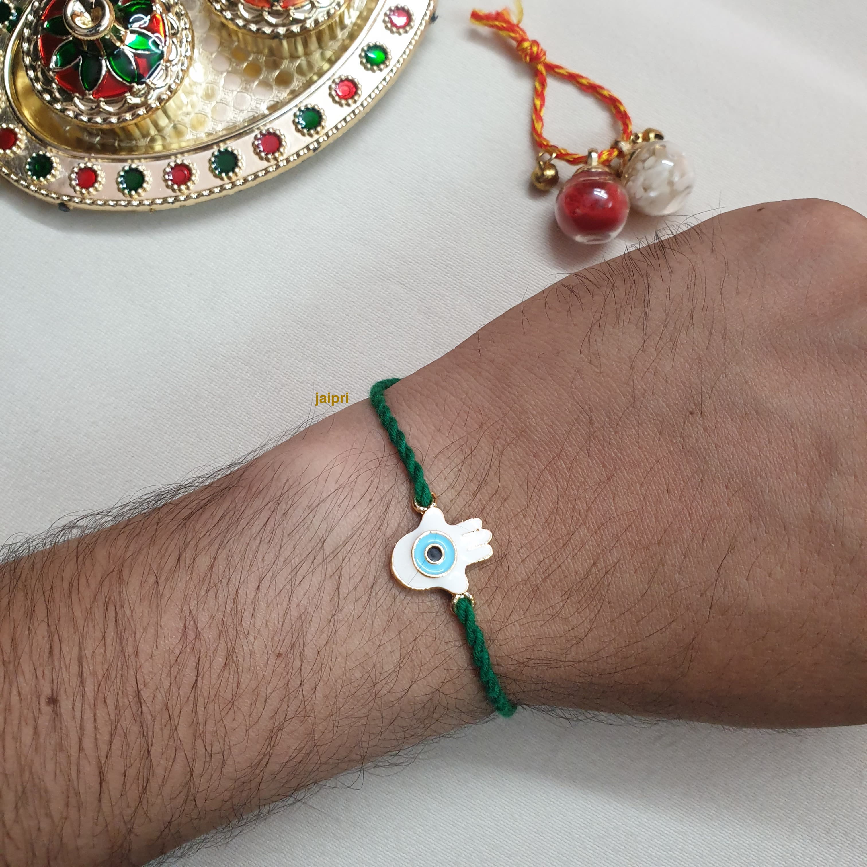 White Humsa Evil Eye Rakhi (Pack of One)