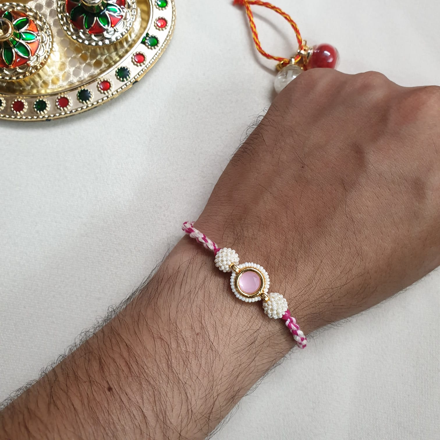 Baby Pink Stone Seed Bead Rakhi For Brother (Pack Of One)