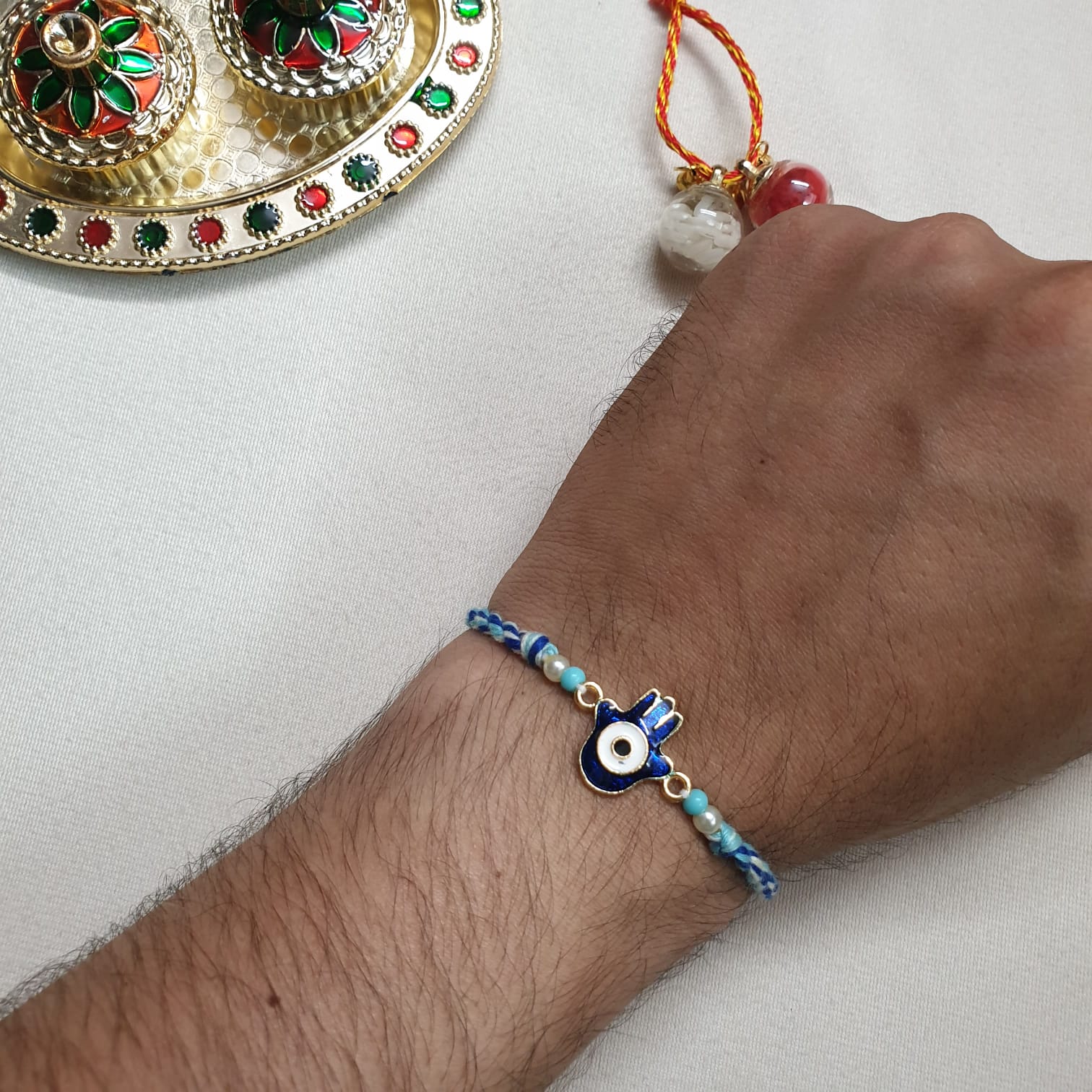 Blue Humsa Stone Rakhi For Brother (Pack Of One)