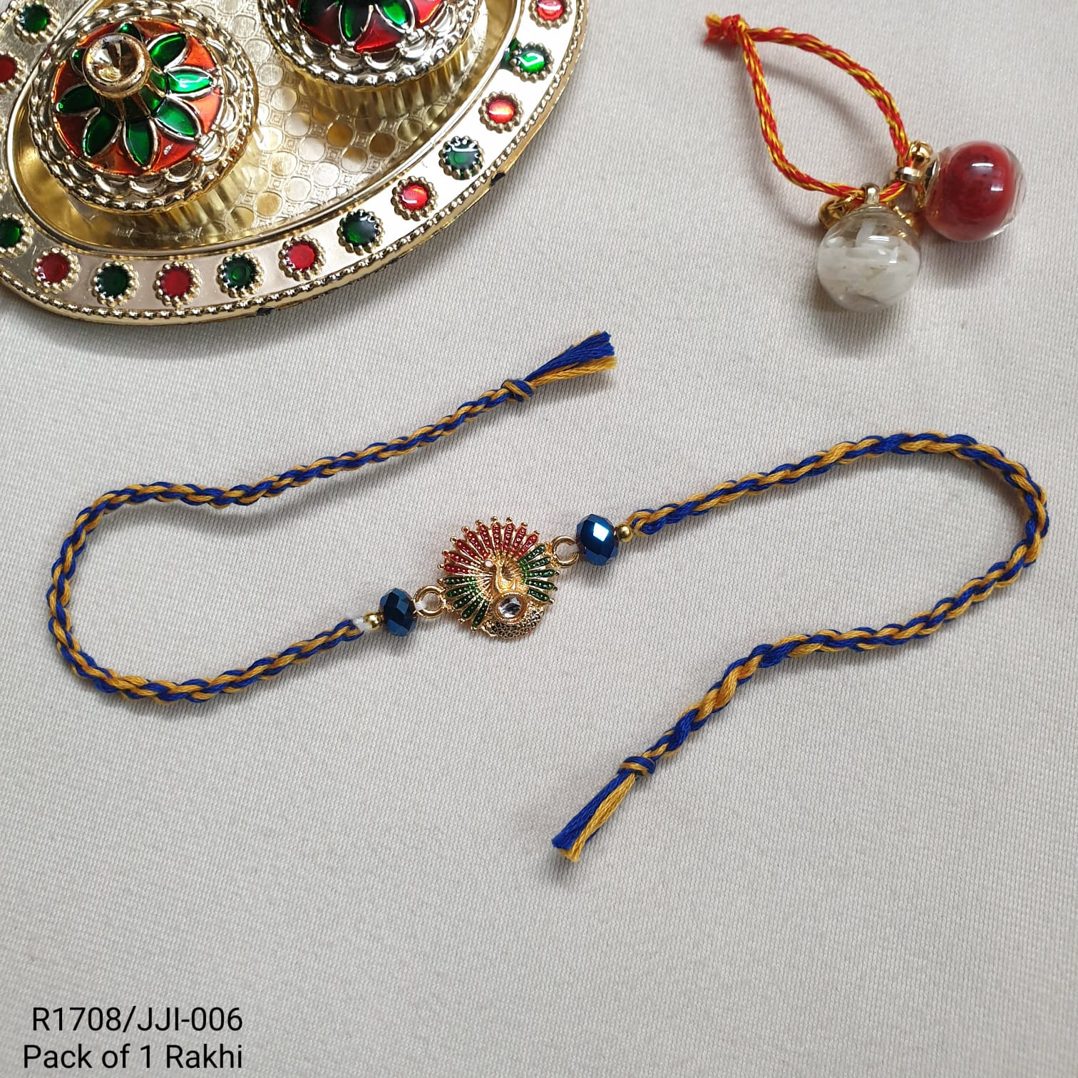 Dancing Peacock Rakhi For Brother (Pack Of One)