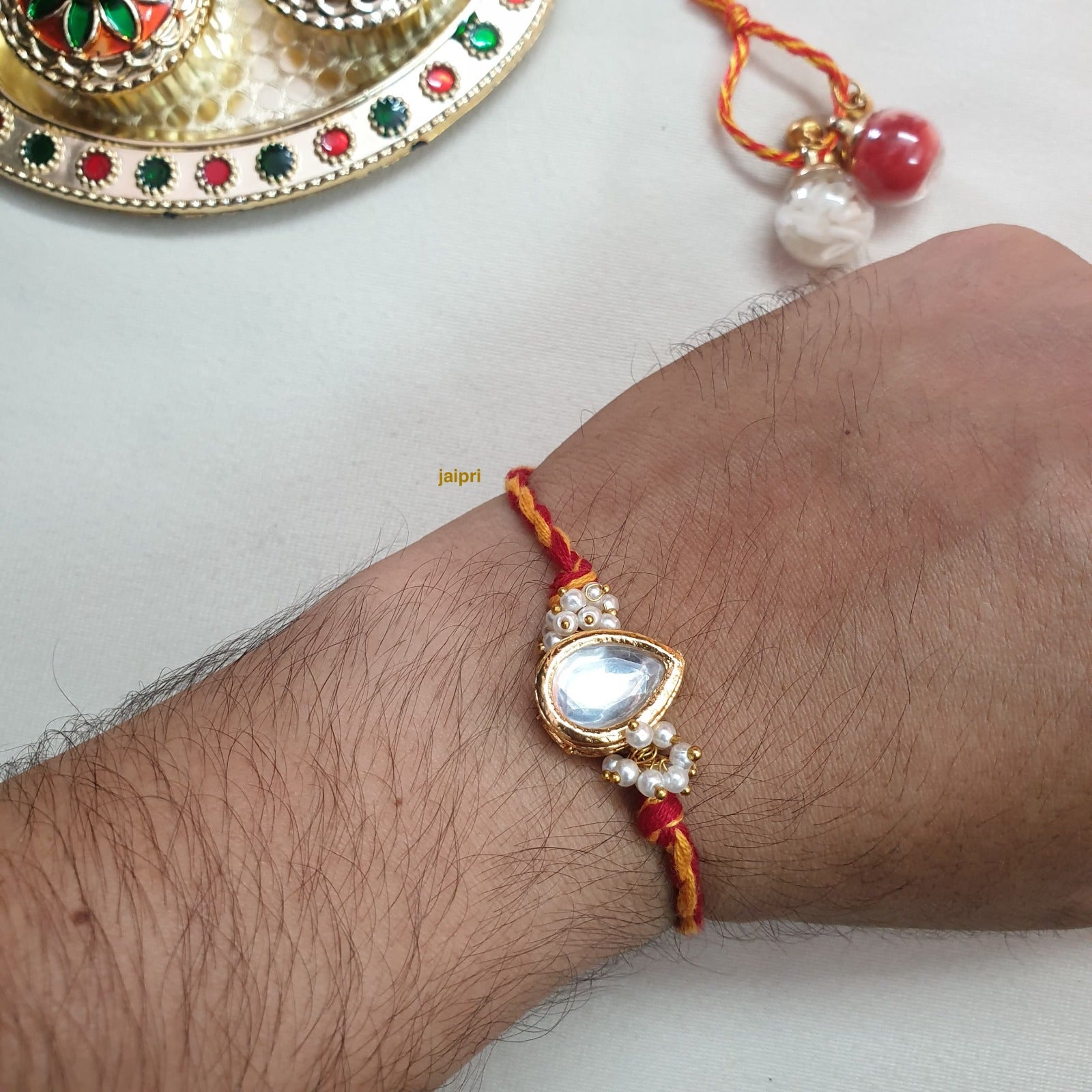Kundan Pearl Rakhi (Pack Of One)