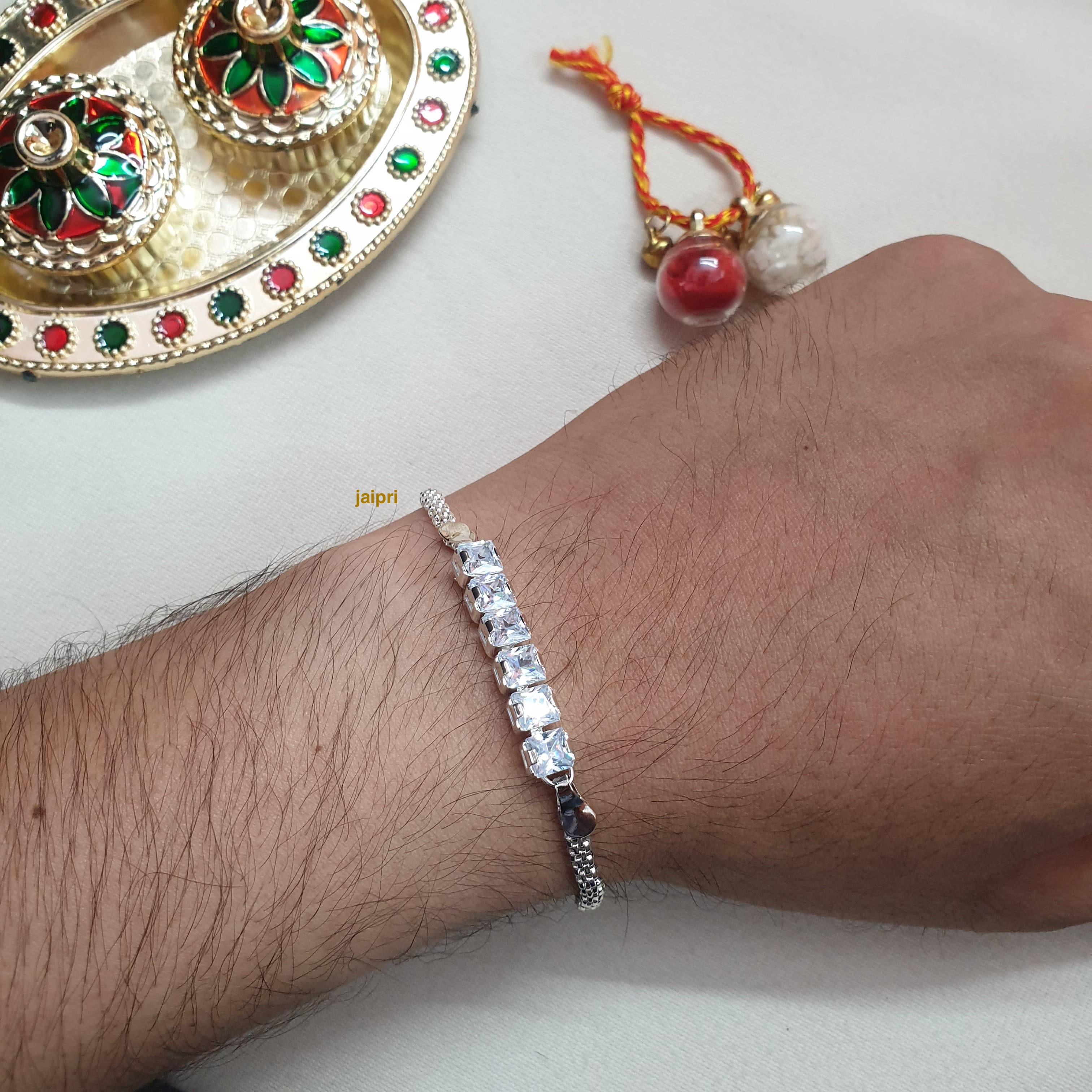 White Stone Silver Plated Rakhi (Pack of One)