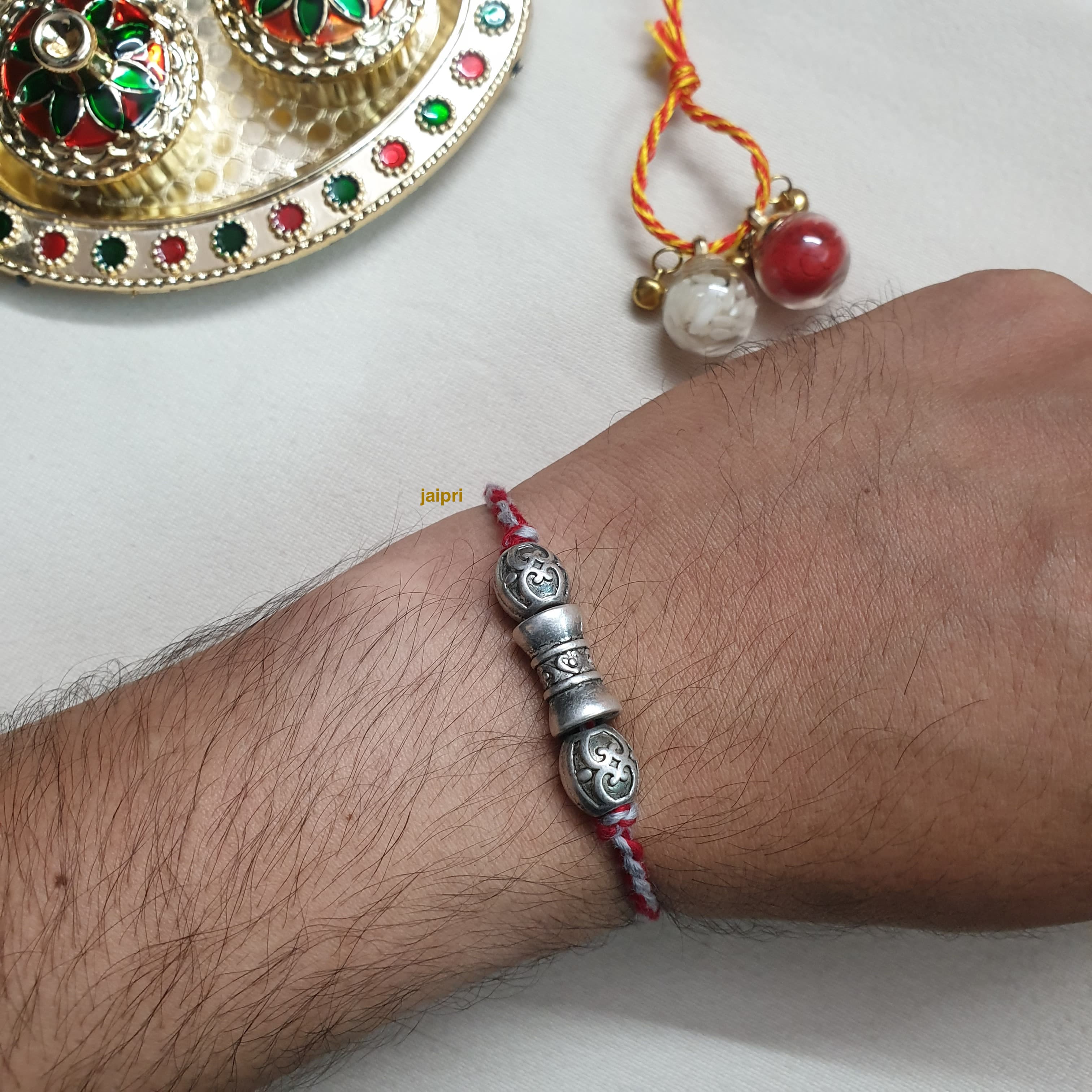 Silver LookaLike Beads Rakhi (Pack of One)