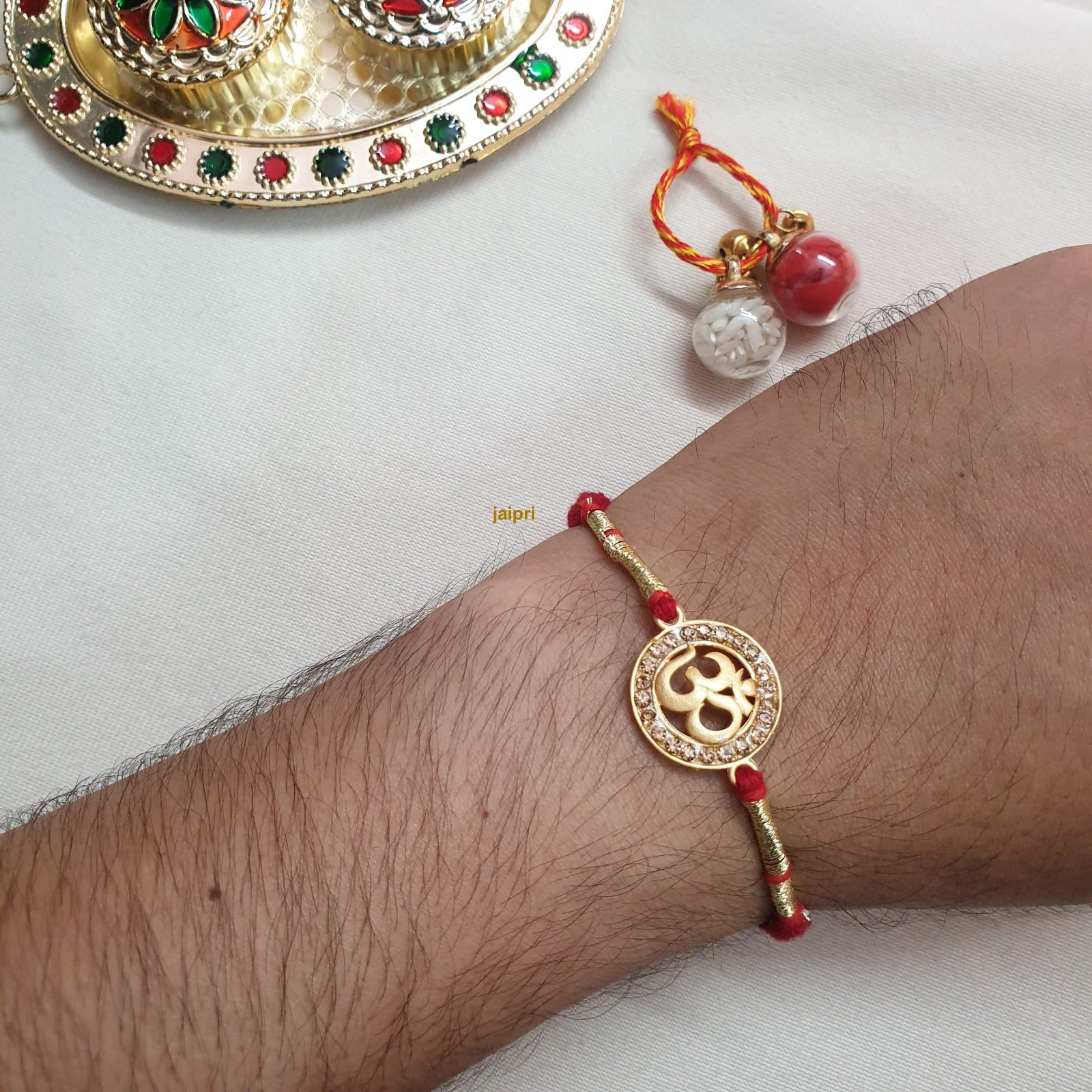 Om Rakhi (Pack Of One)