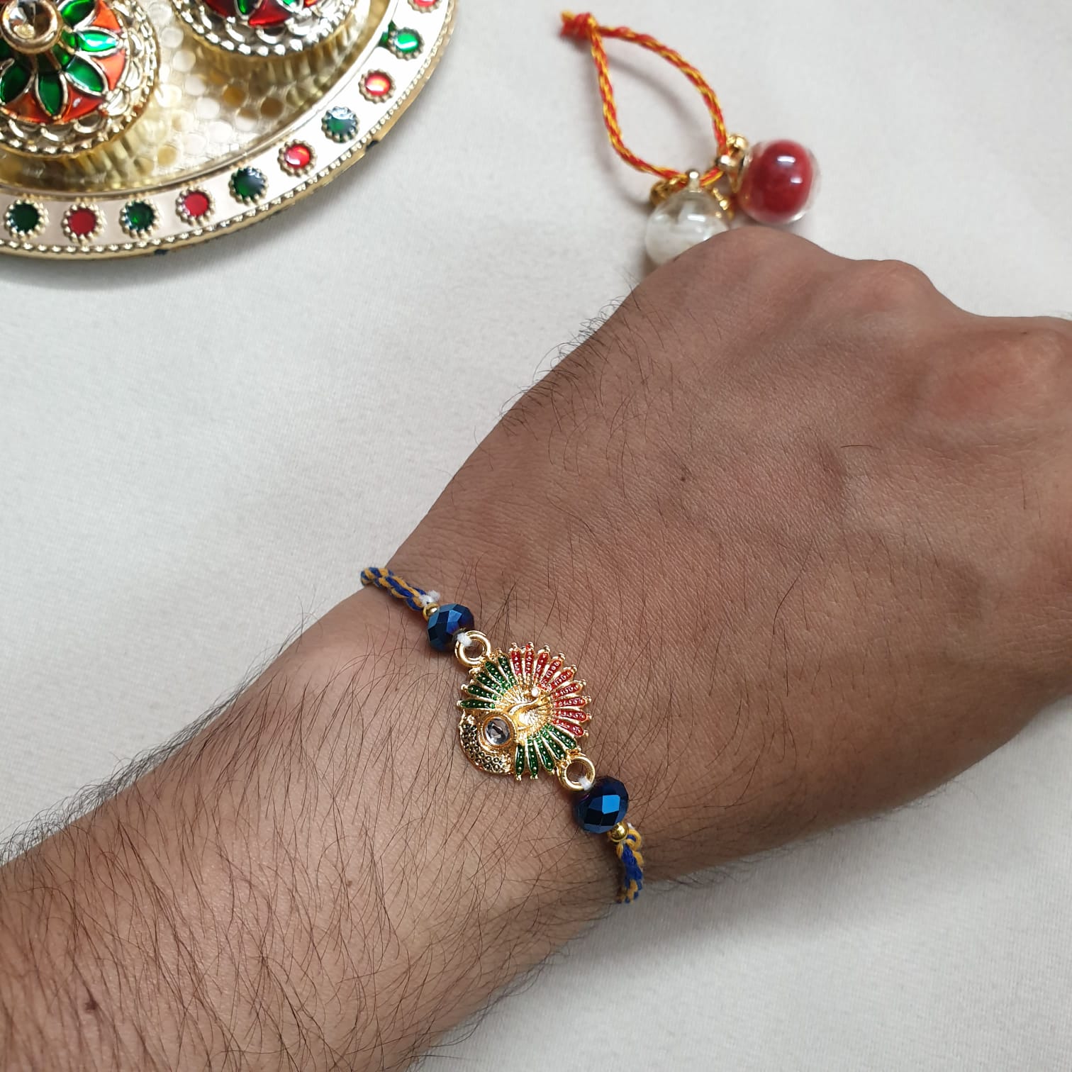 Dancing Peacock Rakhi For Brother (Pack Of One)